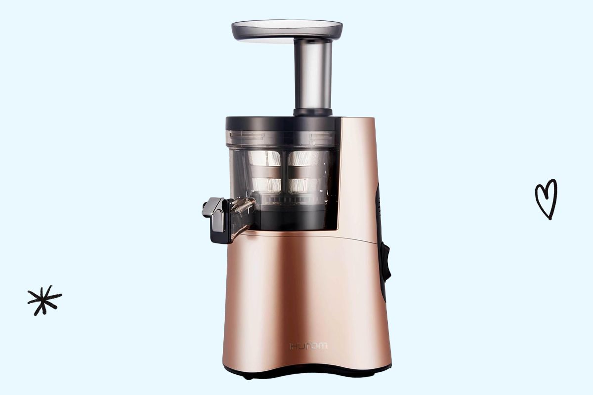 An image of a rose gold Hurom Slow Juicer