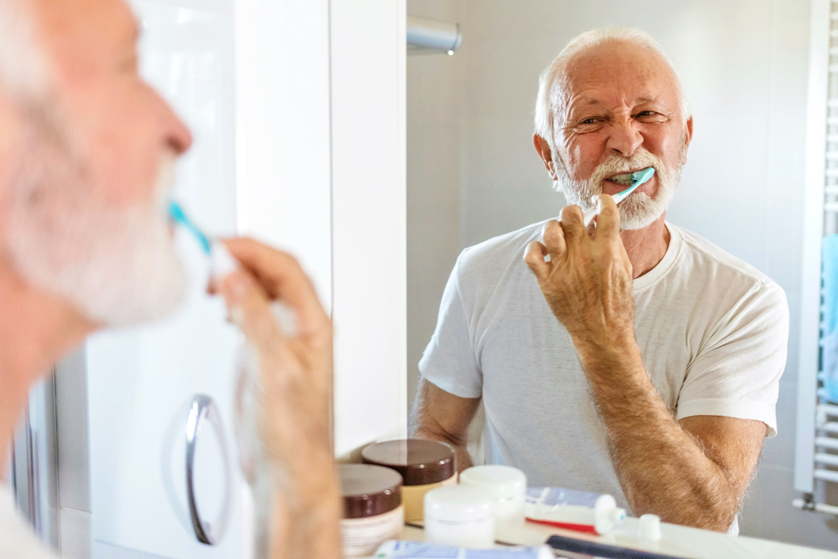Man brushing teeth