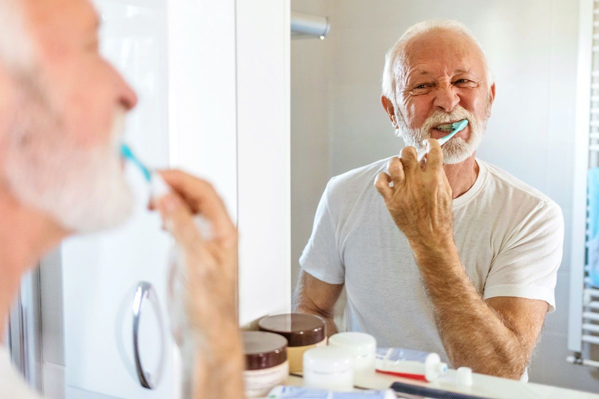 Man brushing teeth