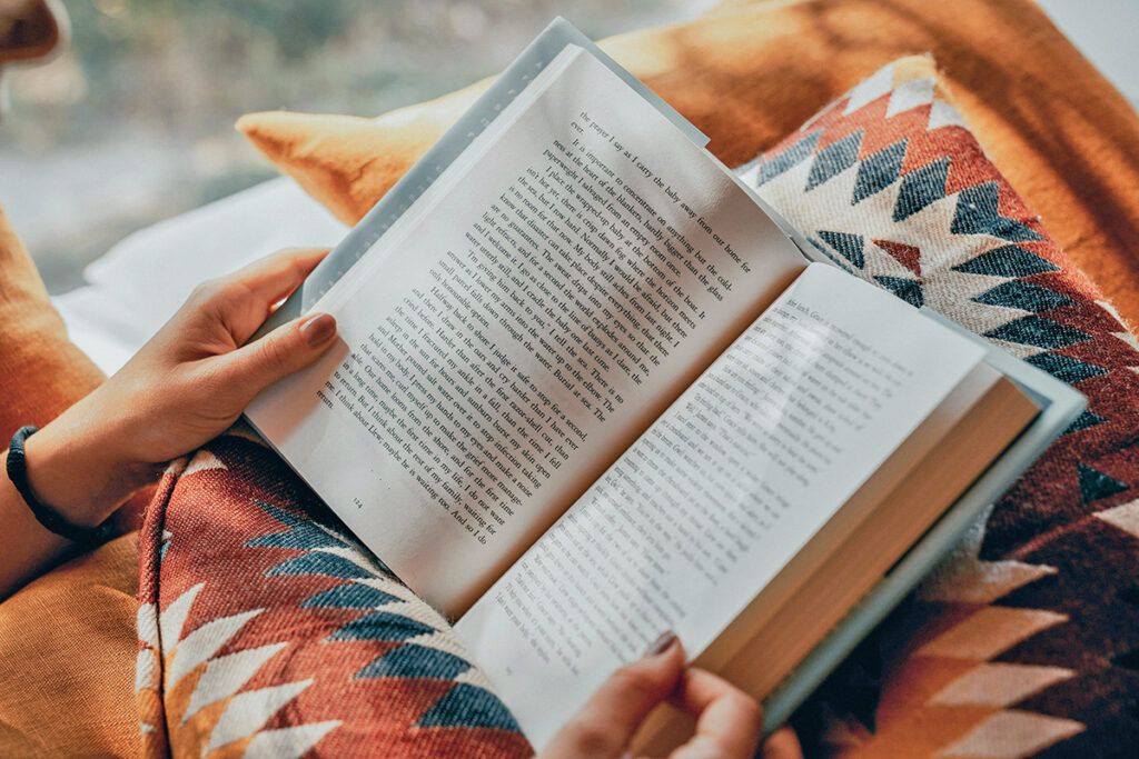 Book in lap