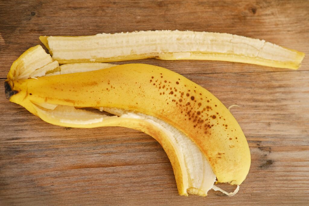 Banana peel on a cutting board