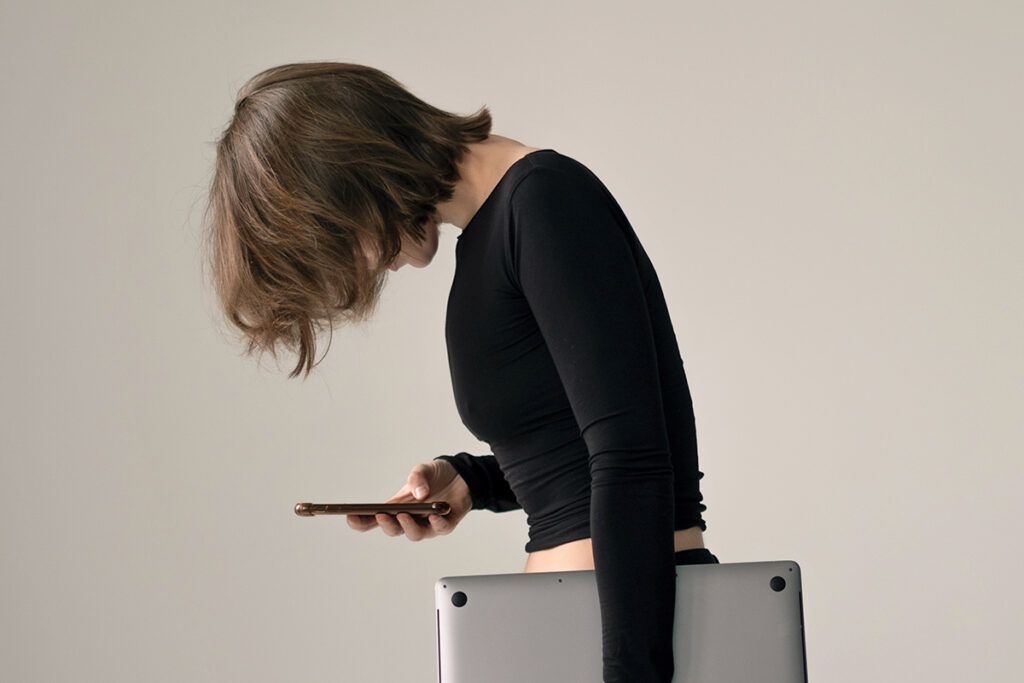 Woman looking down at phone