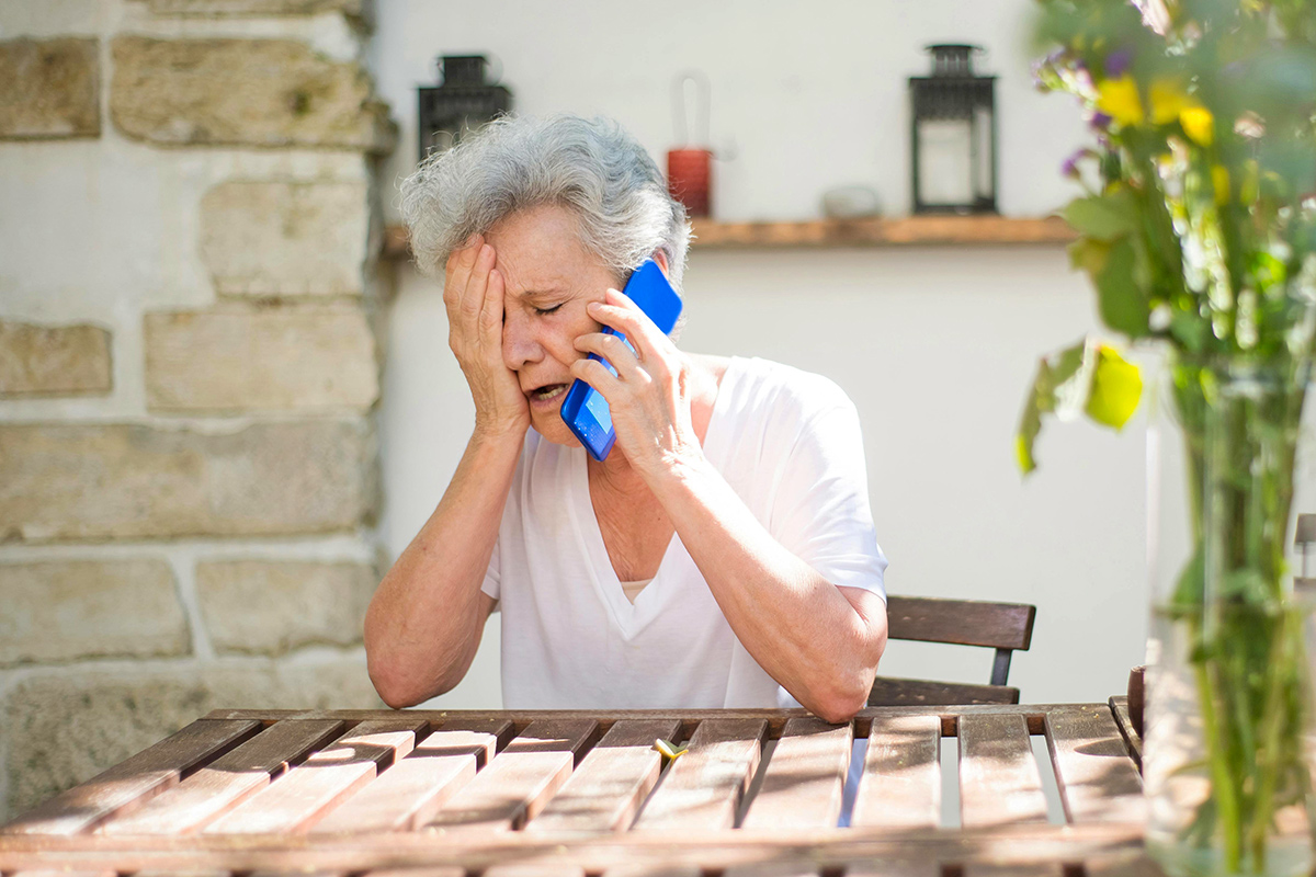 Woman upset on phone