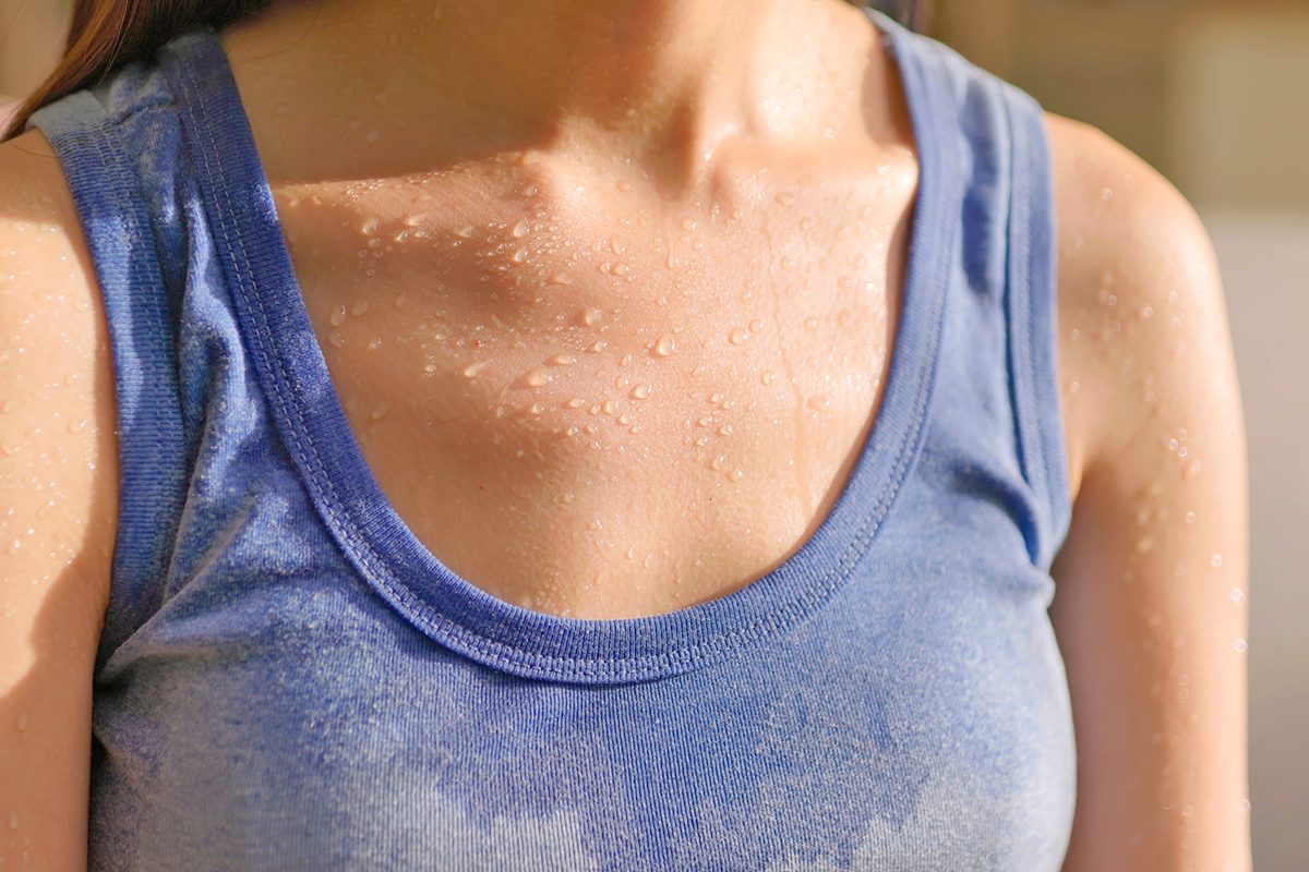Woman sweating