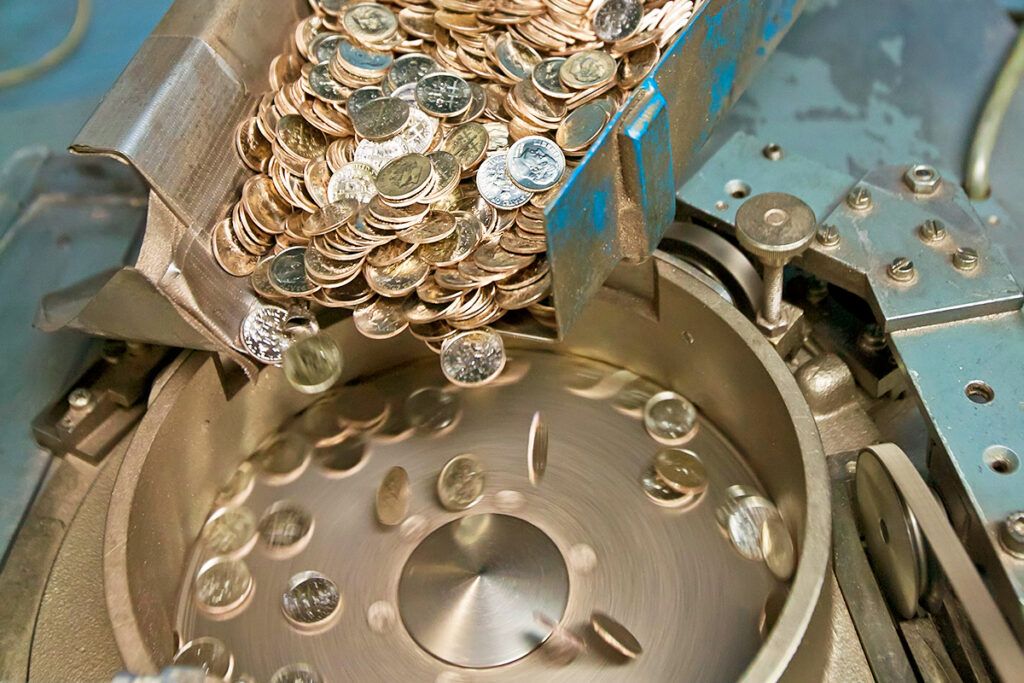 Coins being produced at the Denver Mint