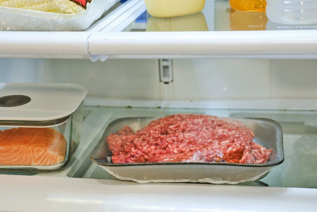 Ground meat on a plate in the fridge