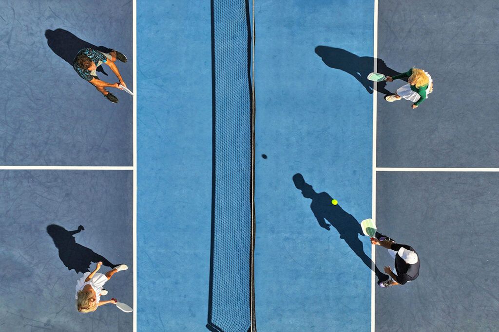 People playing pickleball as seen from above