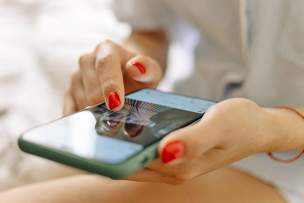 Hands holding phone