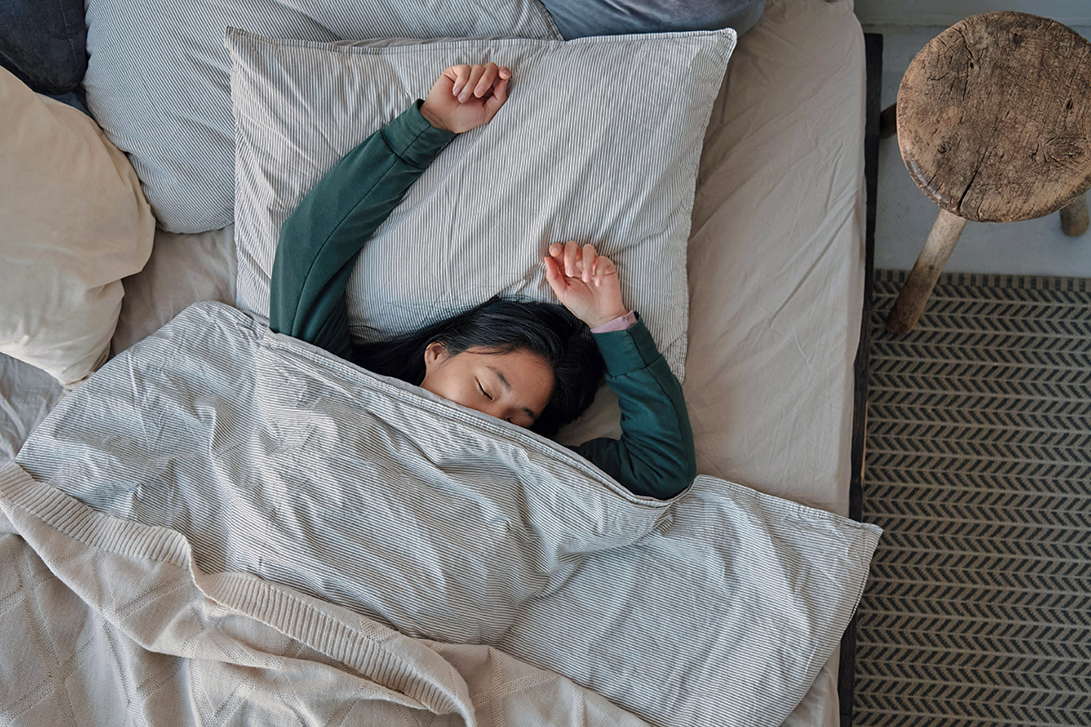 Woman sleeping in bed