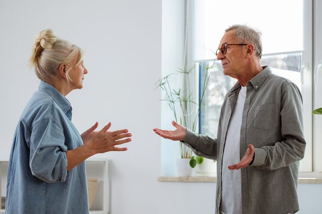 Older couple having a discussion