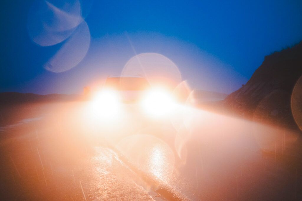 Bright headlights of an oncoming car
