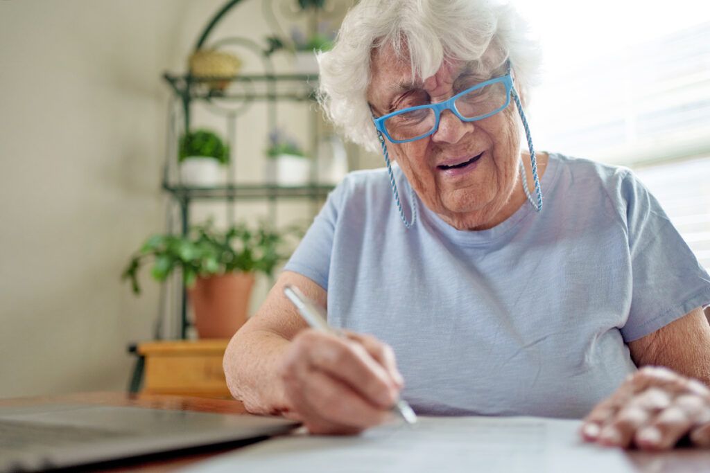 Older woman looking at paperwork