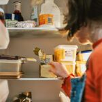 Woman looking in fridge