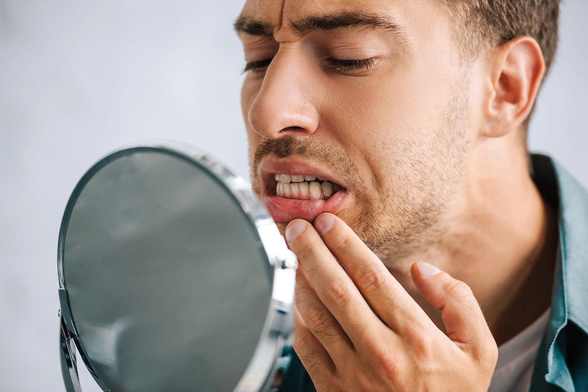 Man looking at teeth