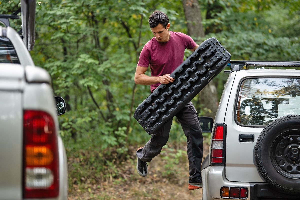 Man with traction mat