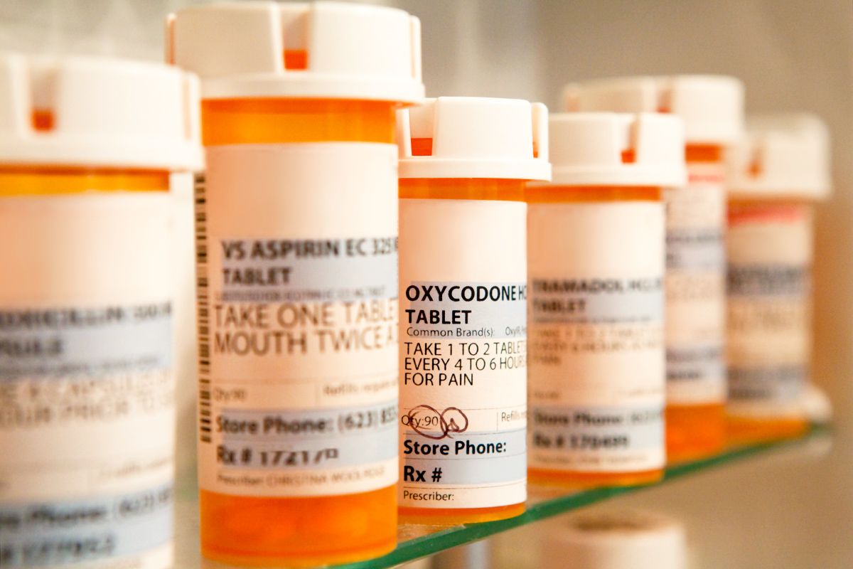 Prescription pill bottles on a shelf