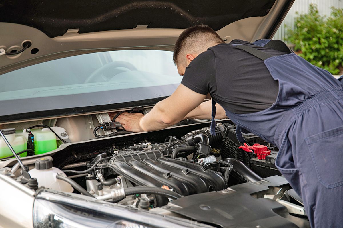 Mechanic working on a car