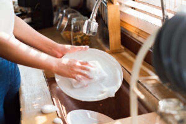 Person washing dishes
