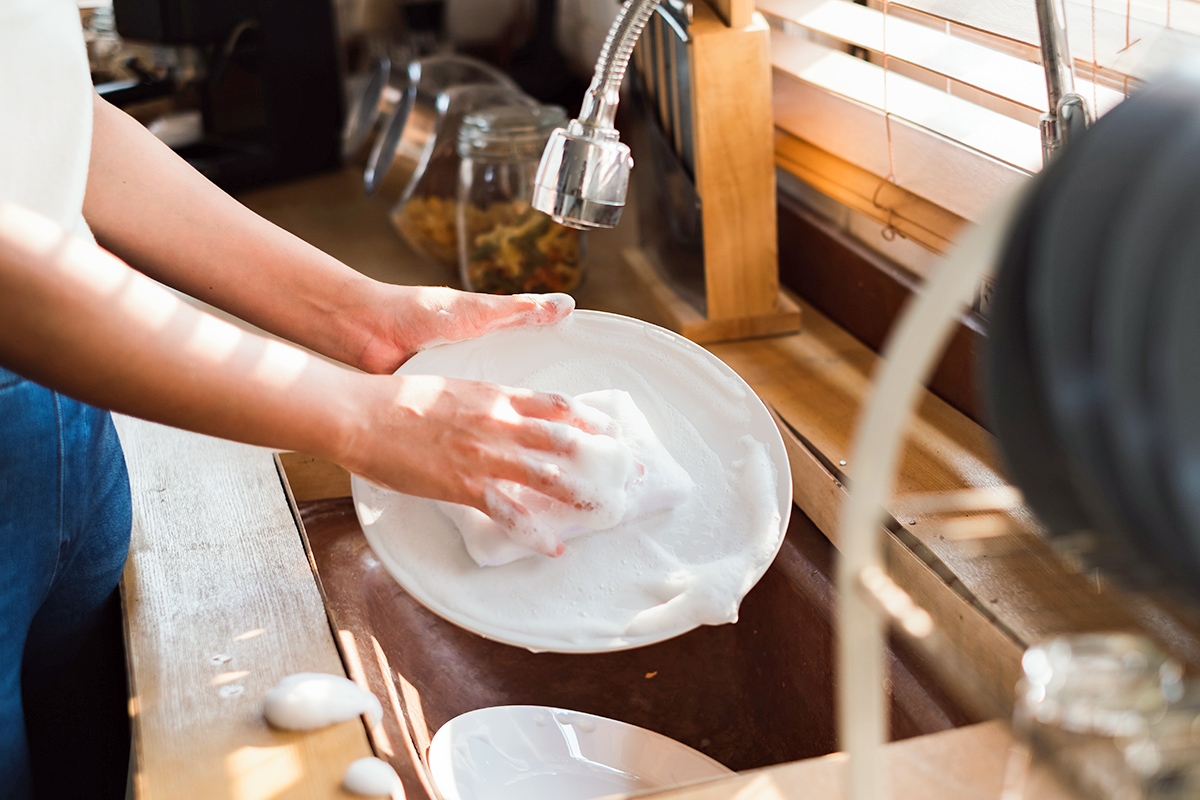 Person washing dishes