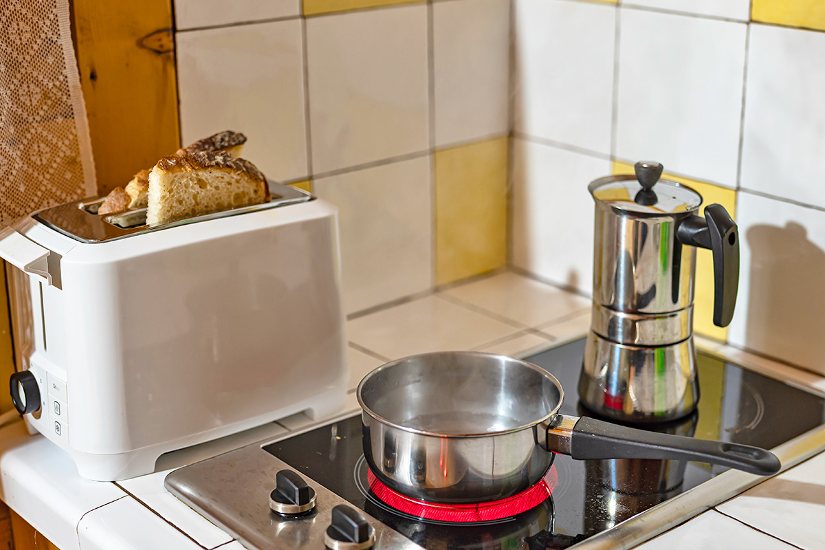 Toaster next to a stove
