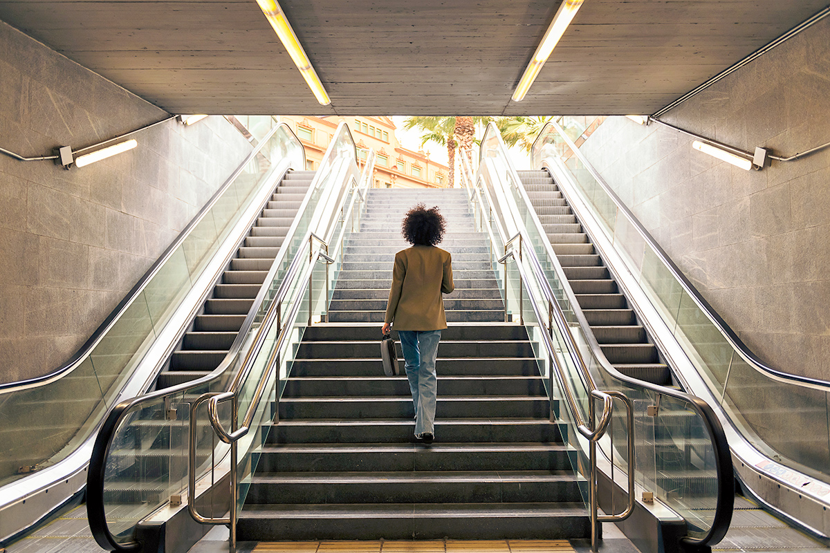 Woman walking up the stairs