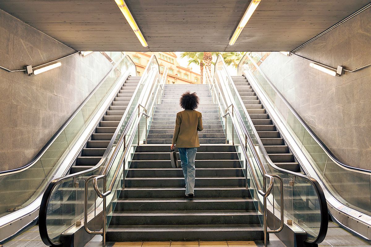 Woman walking up the stairs