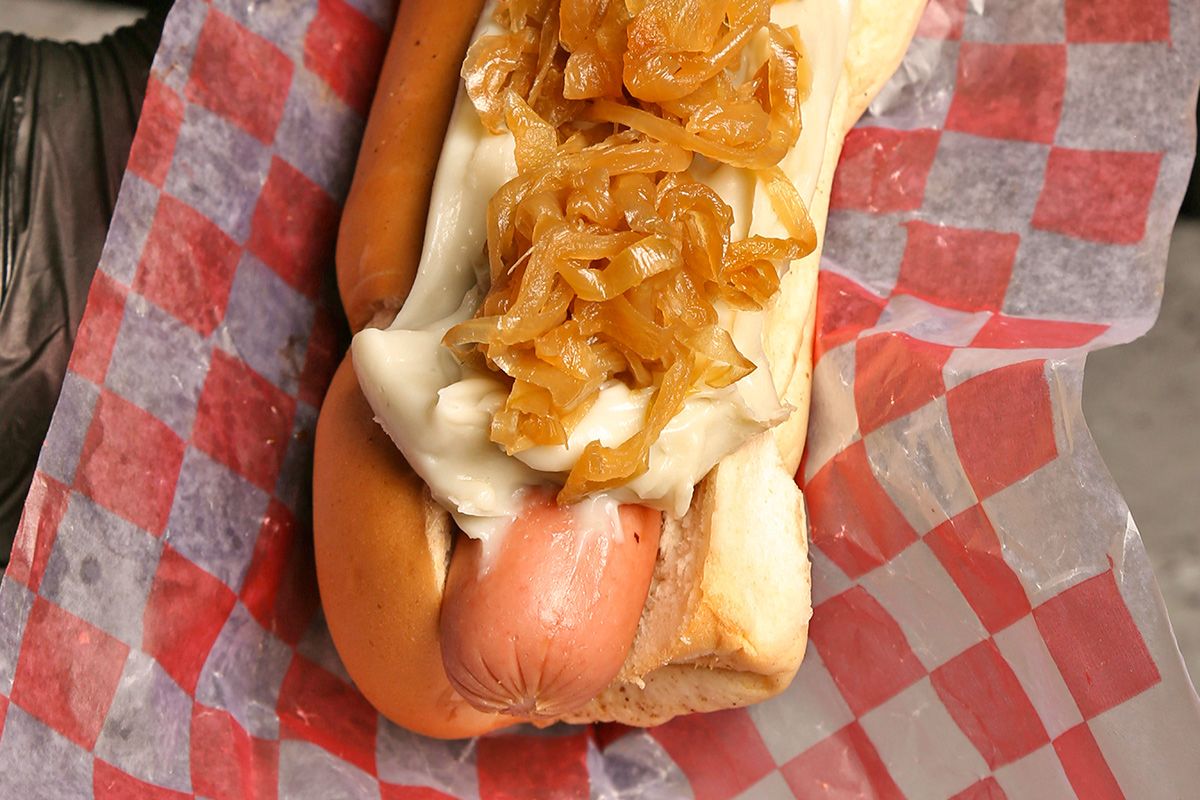 Carmelized onions on a hot dog
