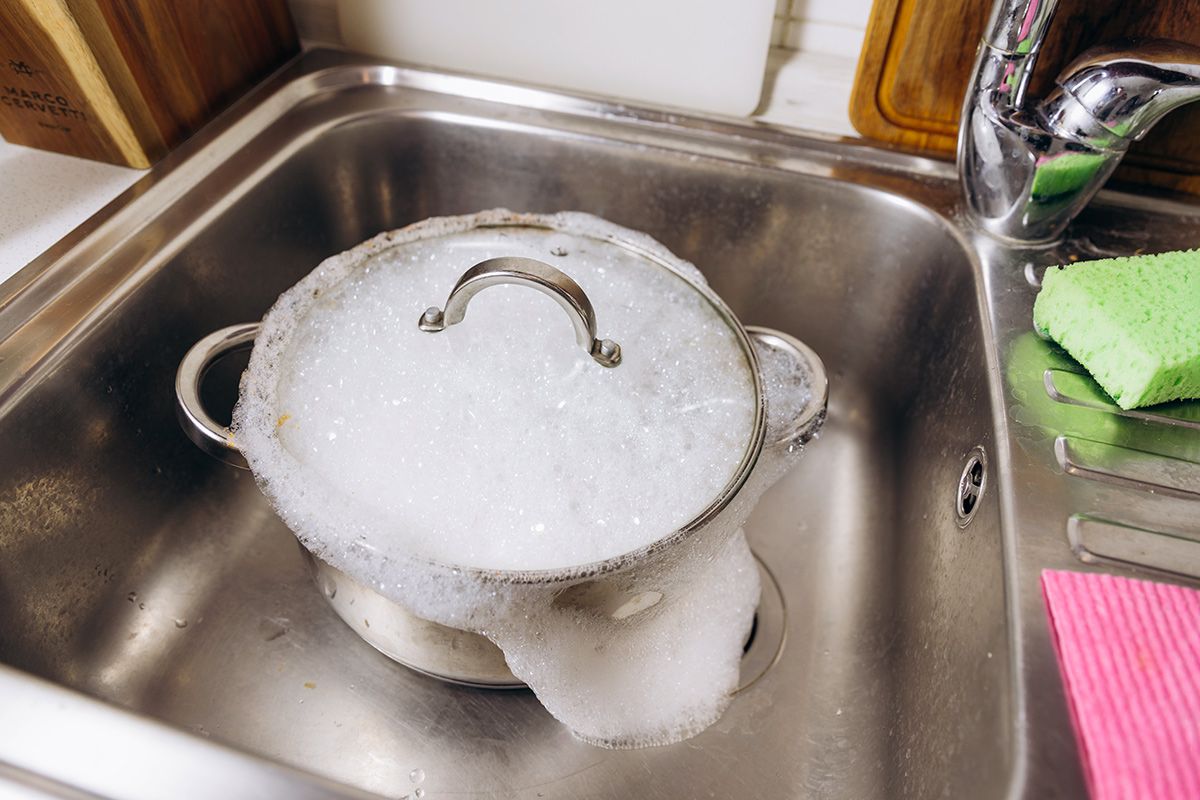 Pot soaking in sink