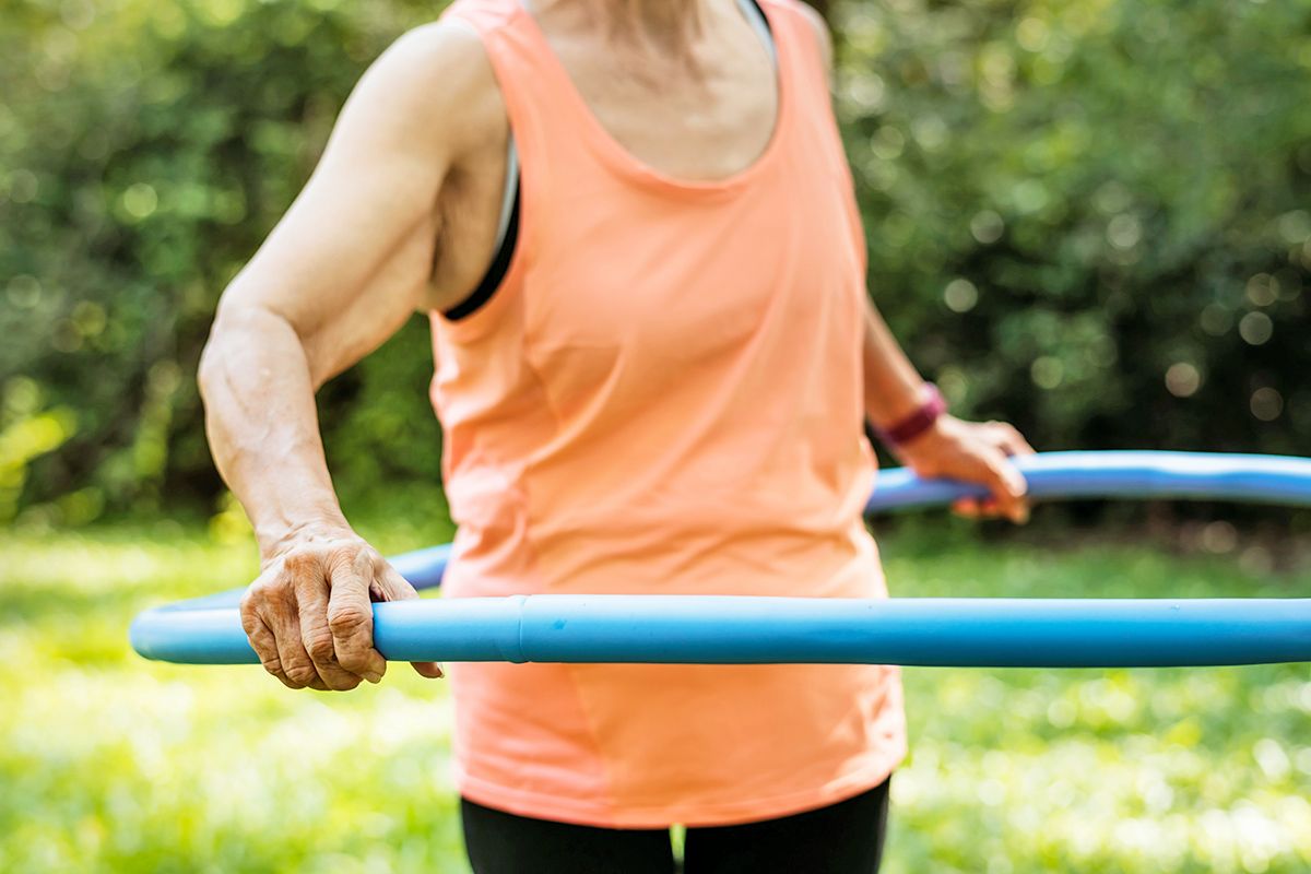 Older person hula hooping