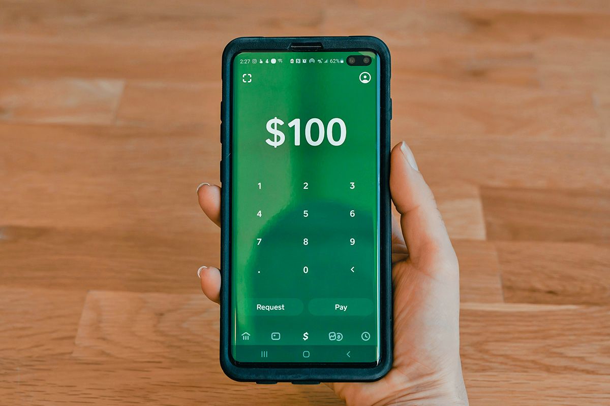 Money app with $100 on screen