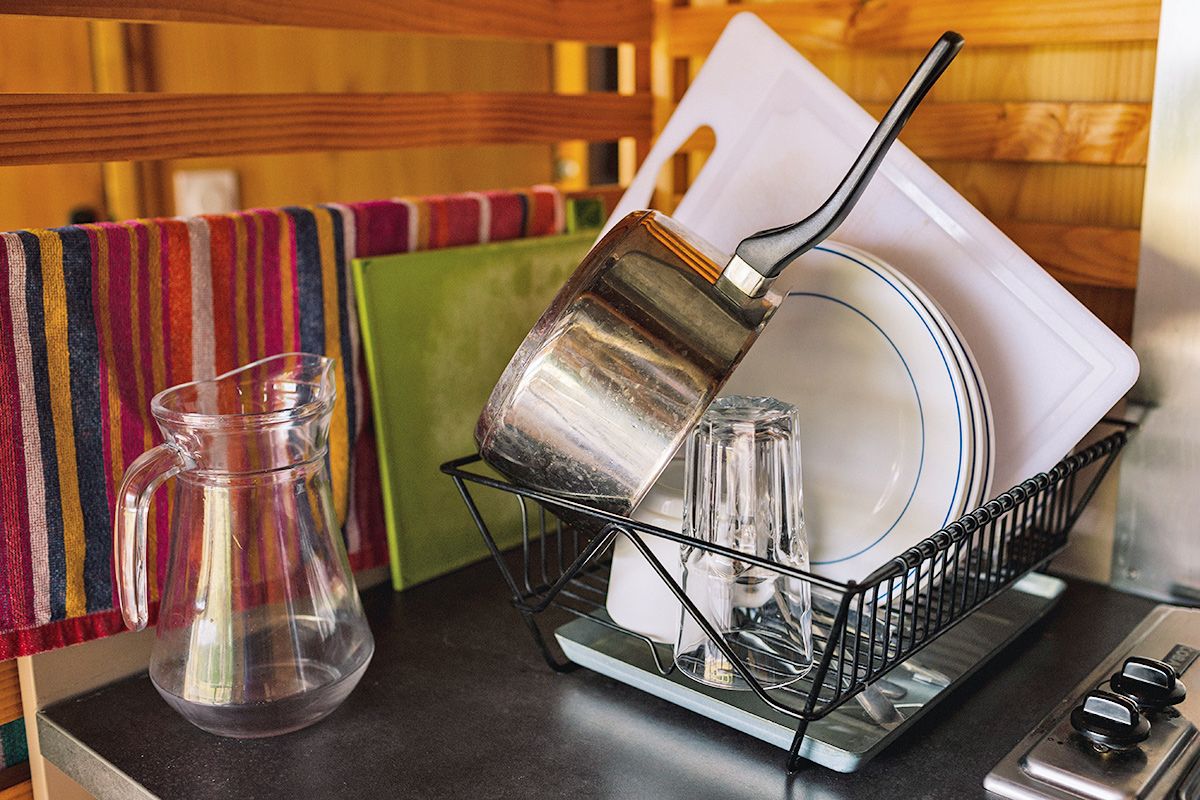 dishes drying in rack