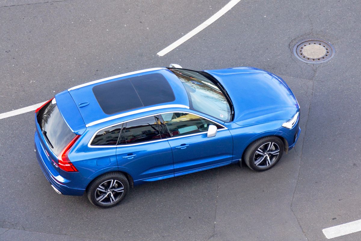 Blue car on road