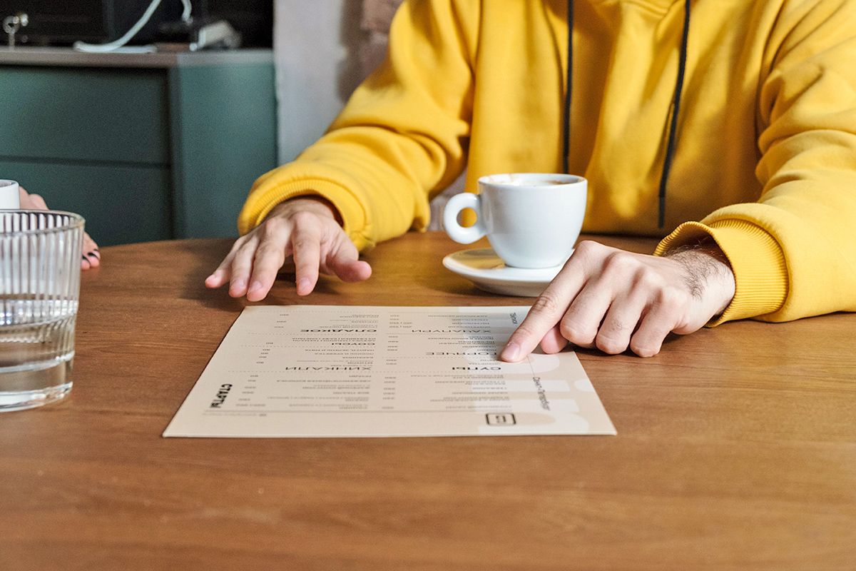 Pointing to item on restaurant menu
