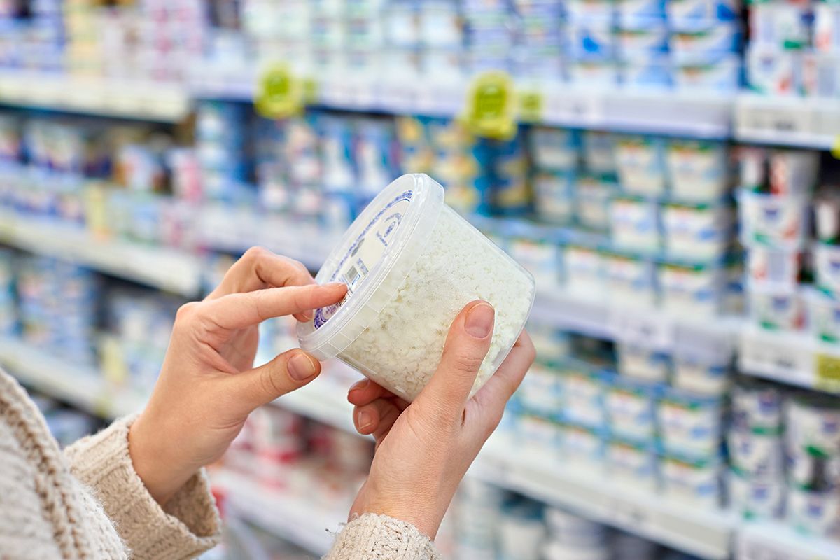 Looking at cottage cheese in store